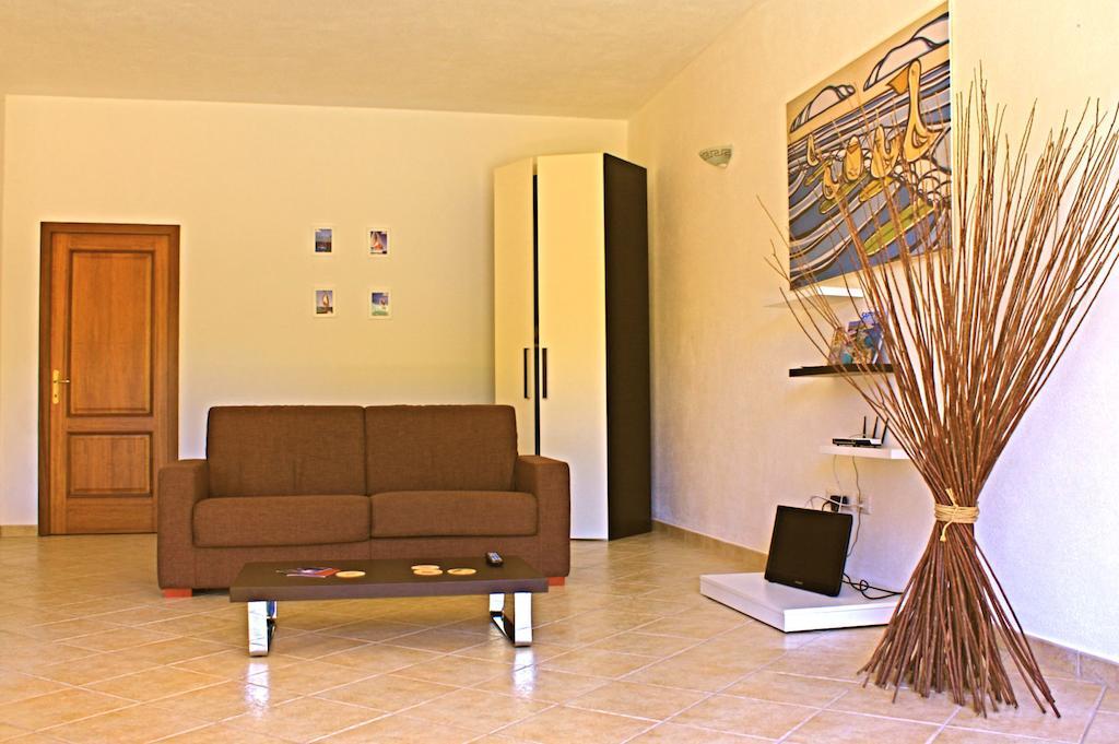 포르토 폴로 Residenze L'Isola Surf House 아파트 호텔 객실 사진